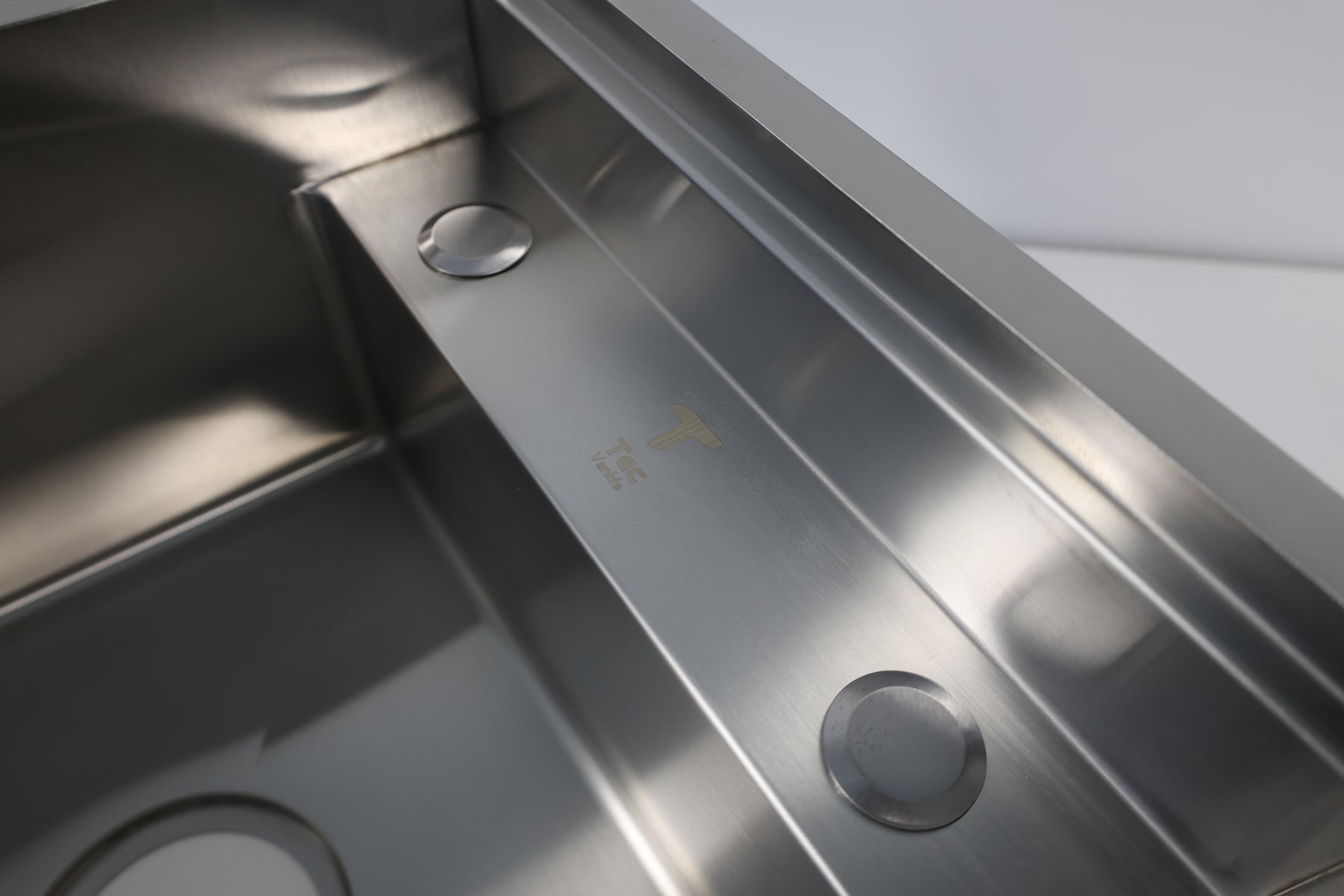Finished van galley featuring the Tec Vanlife hidden-faucet sink